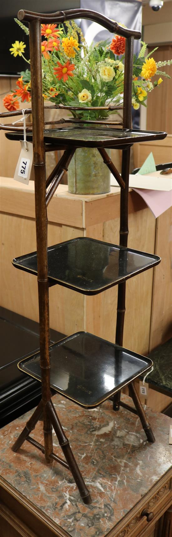 A late Victorian lacquered and bamboo three tier cake stand